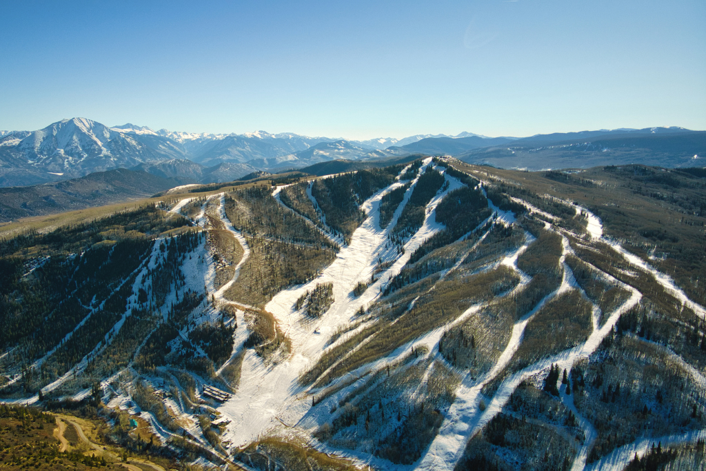 Skier and Boarder on Primo Lift at Sunlight Mountain Resort
